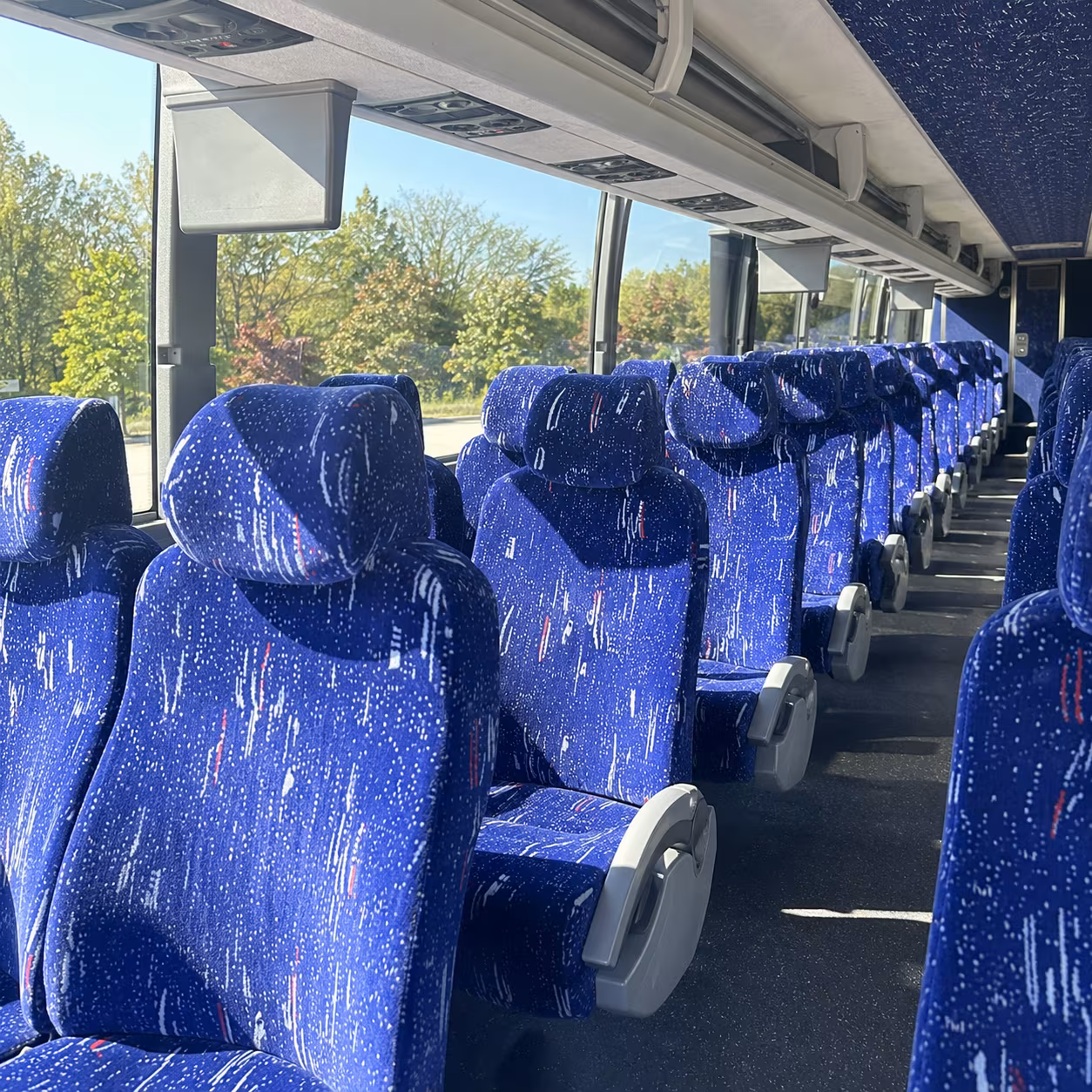 camden 56 passenger charter bus inside